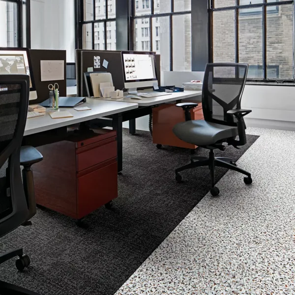Modern office with white terrazzo and grey carpet